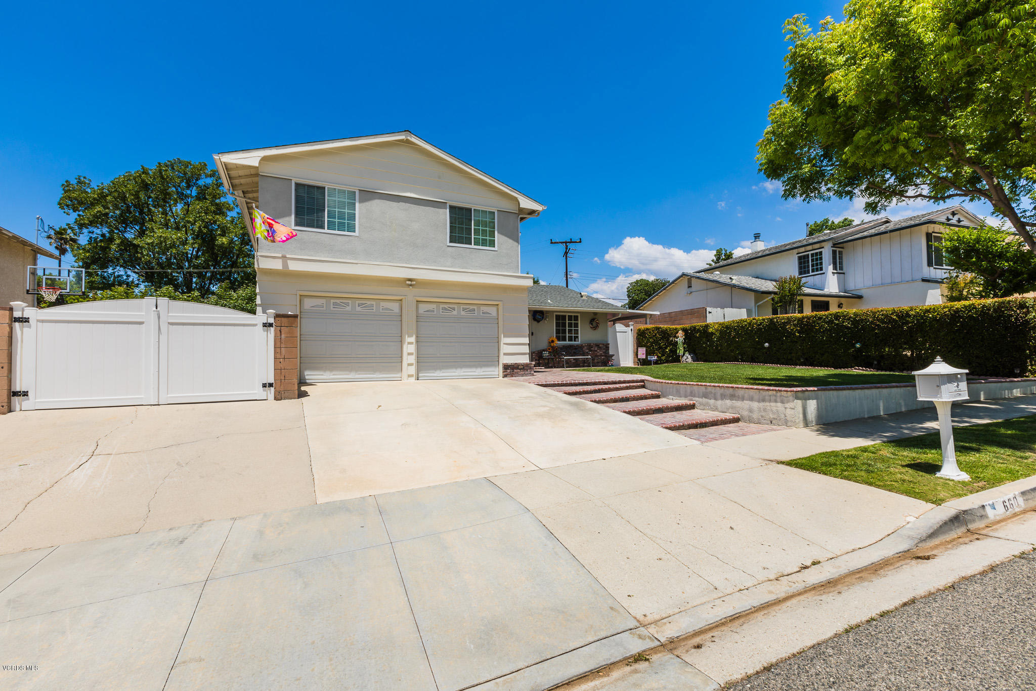 660 Appleton Road Simi Valley, CA 93065 - Photo 2 of 47 a front view of a house with a yard