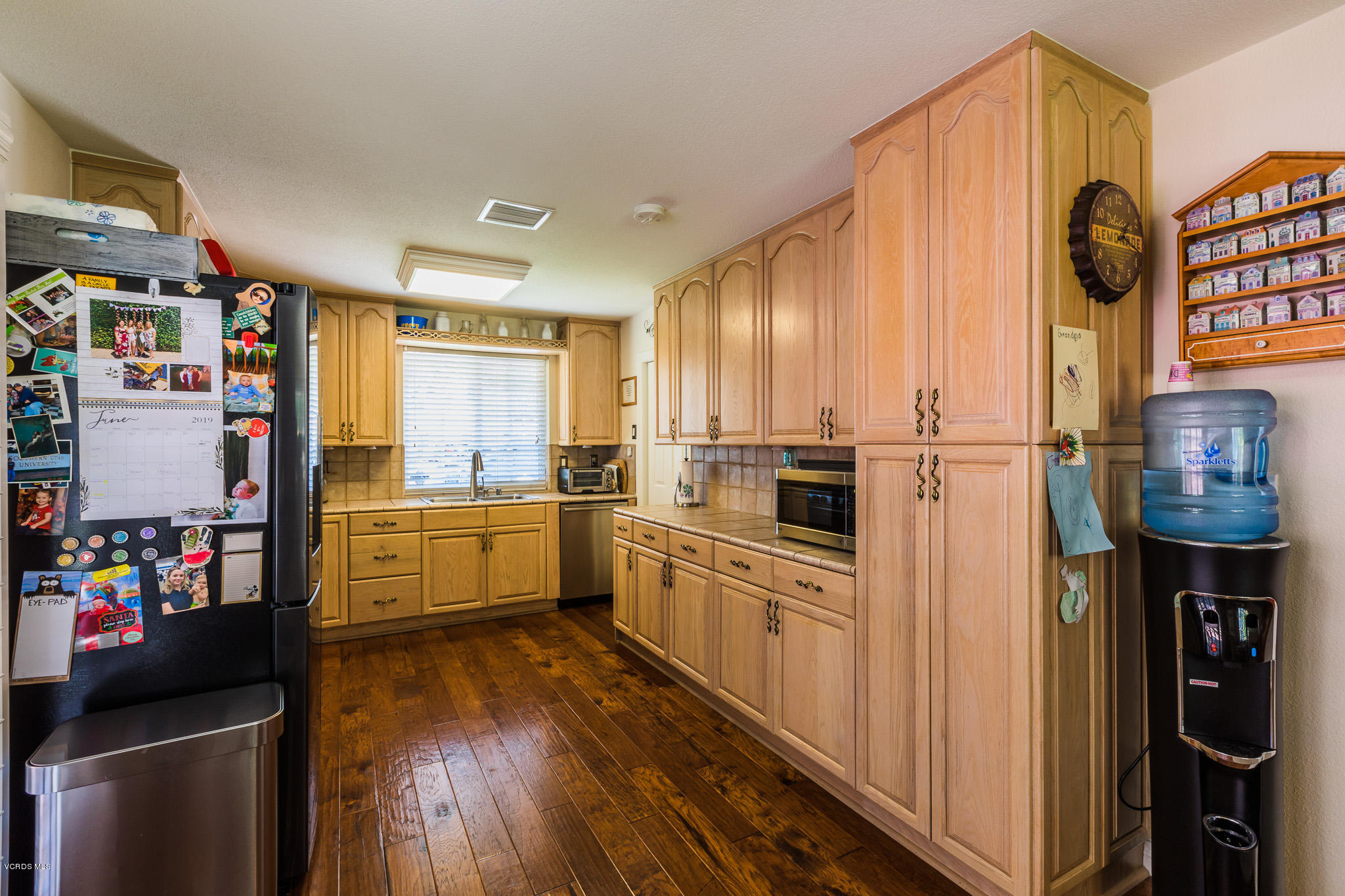 660 Appleton Road Simi Valley, CA 93065 - Photo 17 of 47 a kitchen with stainless steel appliances a refrigerator sink and cabinets