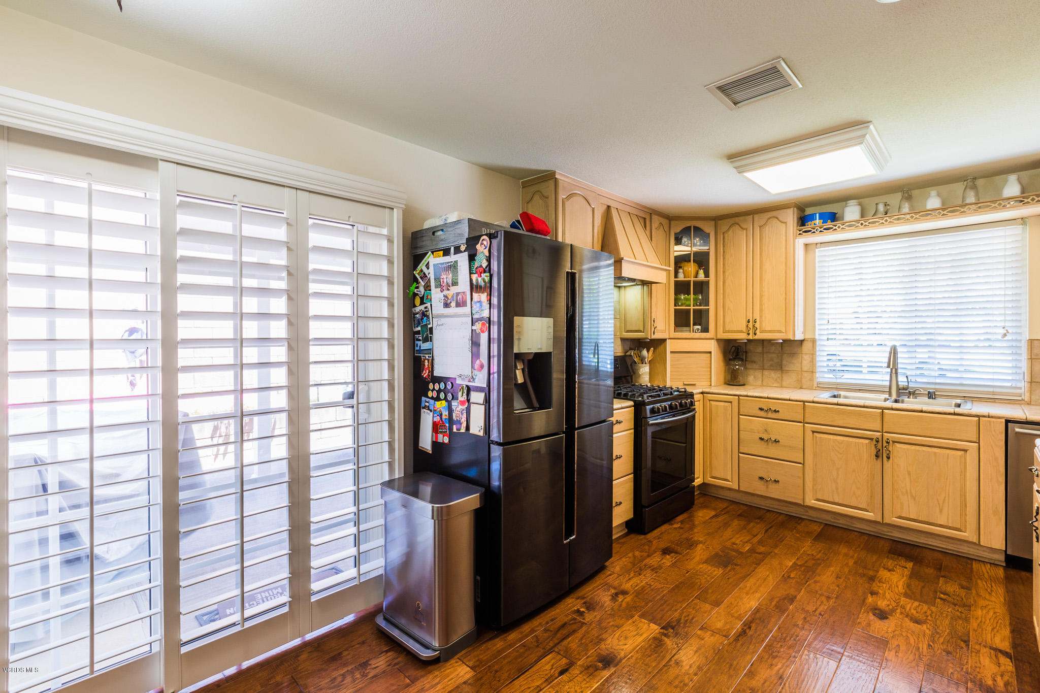 660 Appleton Road Simi Valley, CA 93065 - Photo 18 of 47 a kitchen with stainless steel appliances granite countertop a refrigerator and a sink