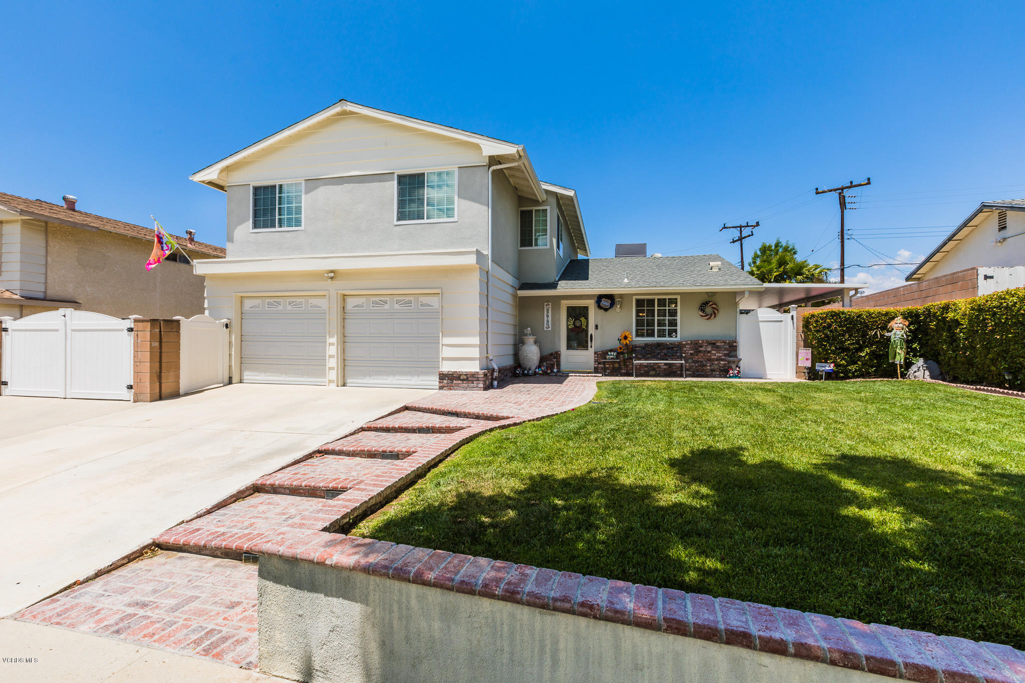 660 Appleton Road Simi Valley, CA 93065 - Photo 3 of 47 a front view of a house with a yard
