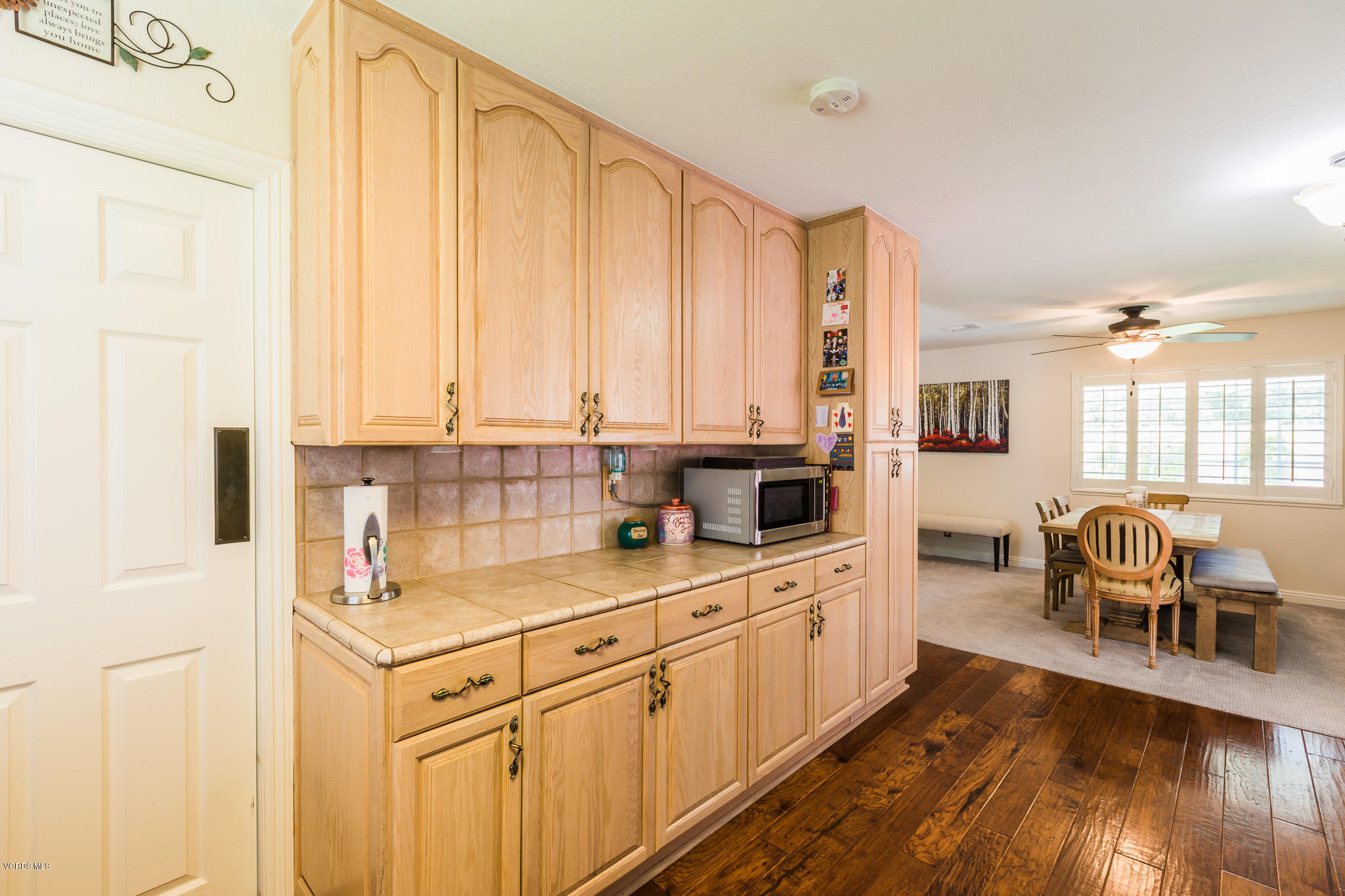 660 Appleton Road Simi Valley, CA 93065 - Photo 21 of 47 a kitchen with a sink stove and cabinets