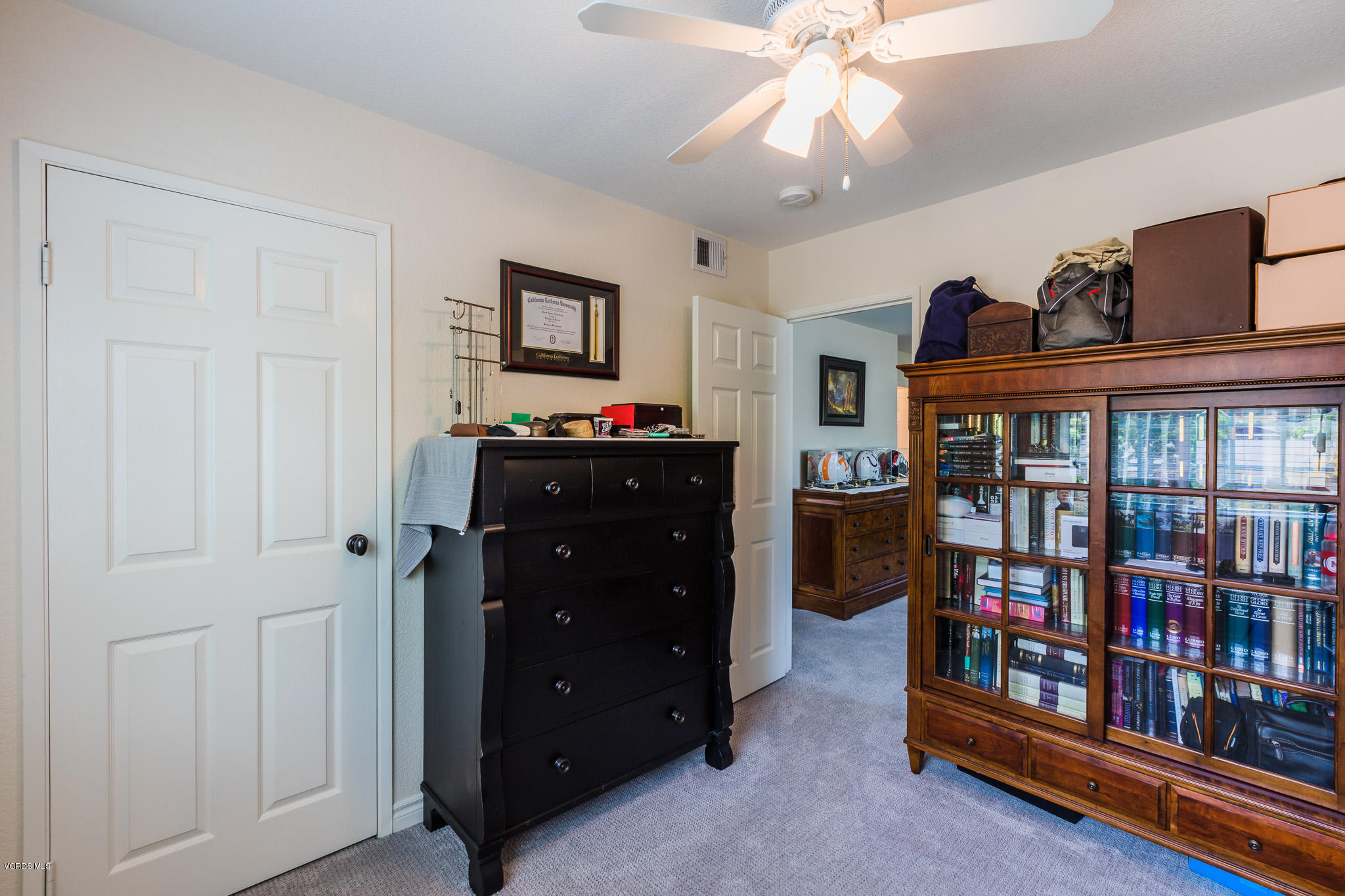 660 Appleton Road Simi Valley, CA 93065 - Photo 29 of 47 a living room with furniture and a baby crib
