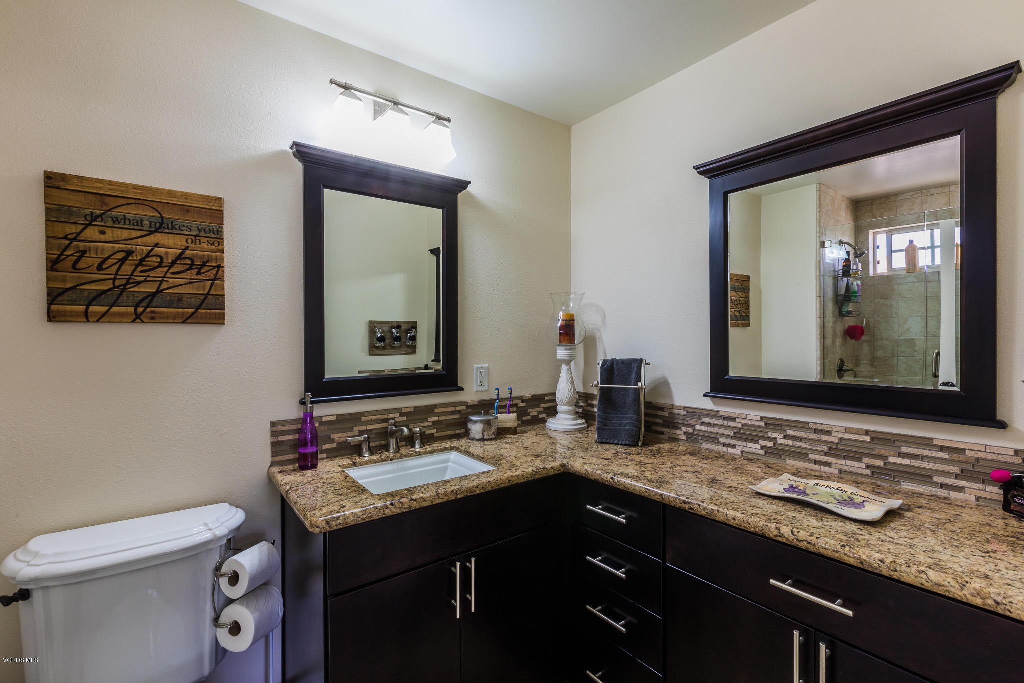 660 Appleton Road Simi Valley, CA 93065 - Photo 32 of 47 a bathroom with a sink and a mirror