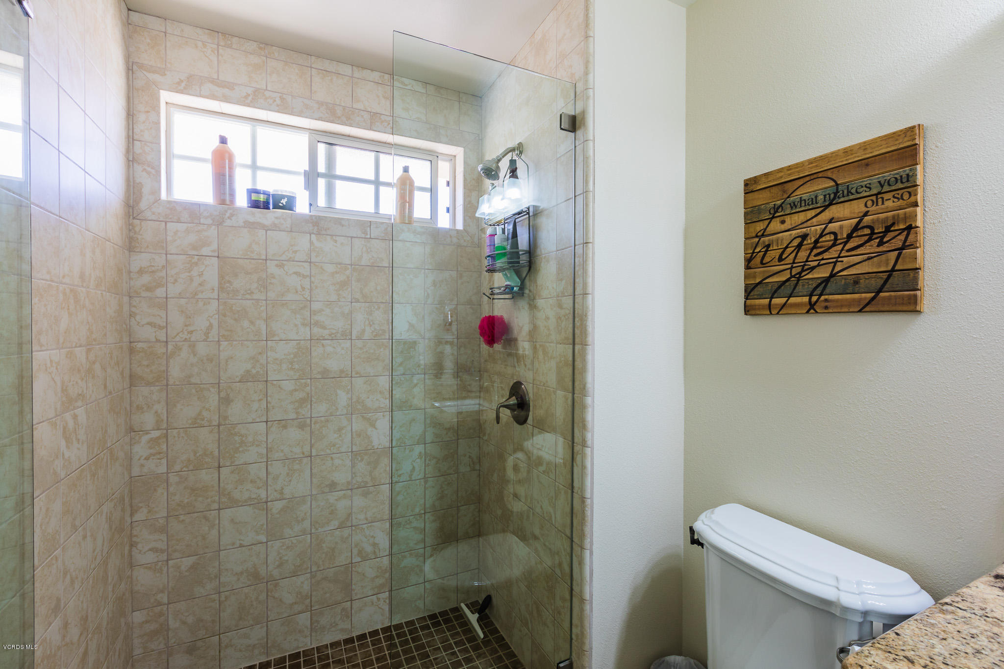660 Appleton Road Simi Valley, CA 93065 - Photo 33 of 47 a bathroom with a toilet and a shower