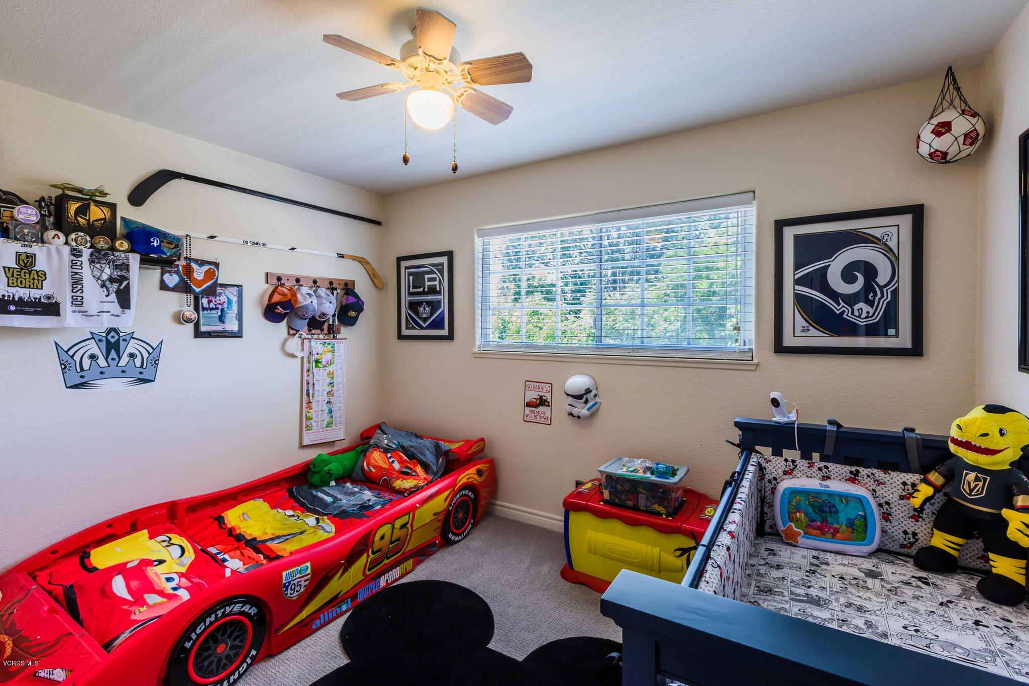 660 Appleton Road Simi Valley, CA 93065 - Photo 35 of 47 a bedroom with a bed and a wooden floor
