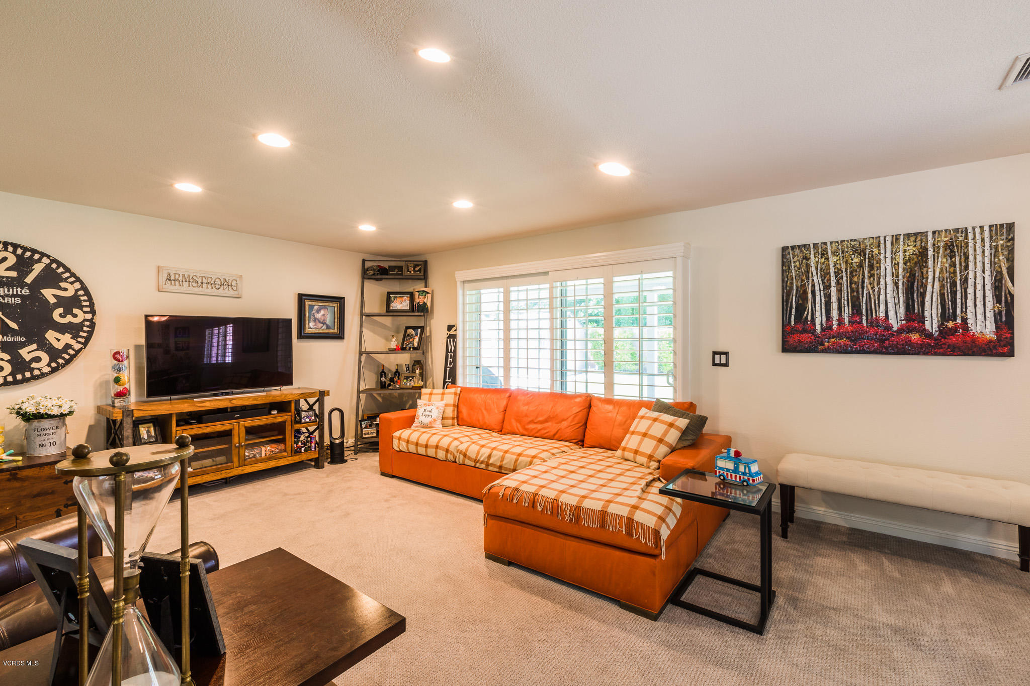660 Appleton Road Simi Valley, CA 93065 - Photo 8 of 47 a living room with furniture and a flat screen tv