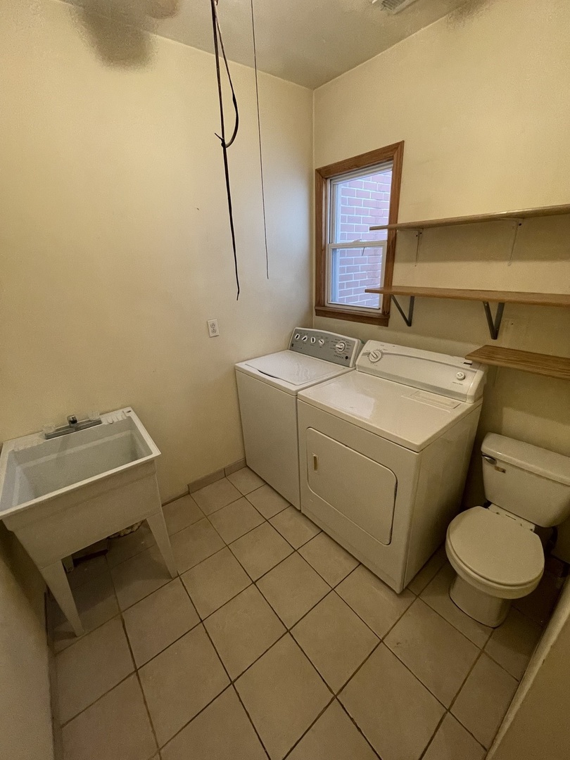 1834 South Racine Avenue Chicago, IL 60608 - Photo 33 of 36 a utility room with dryer and washer