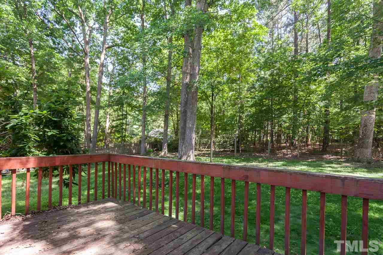 5509 Banwell Place Raleigh, NC 27613 - Photo 7 of 17 a view of a wooden roof deck