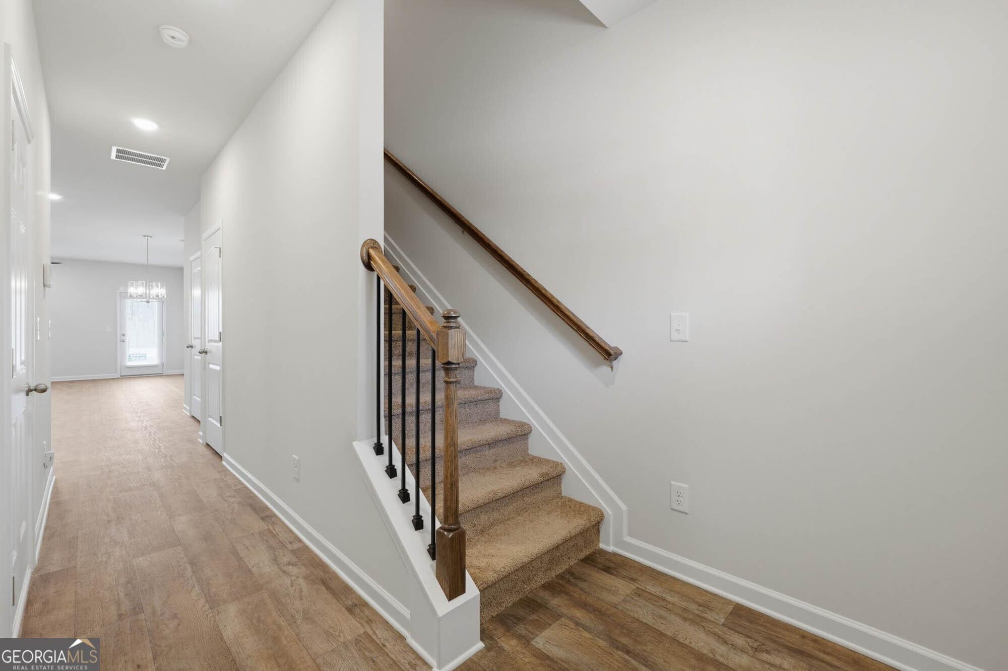 5284 Magnolia Grove Way Gainesville, GA 30504 - Photo 16 of 31 a view of entryway with wooden floor