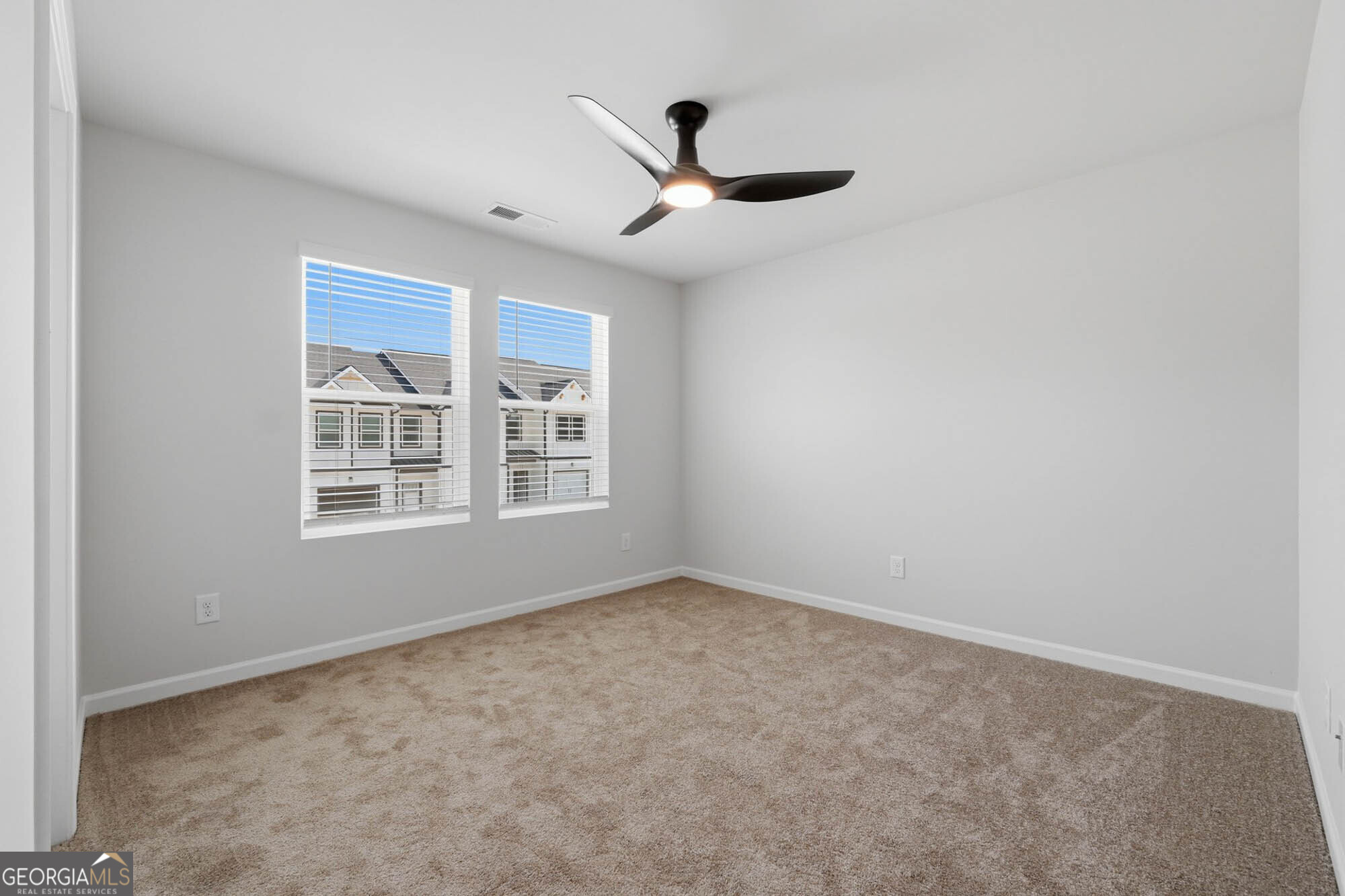 5284 Magnolia Grove Way Gainesville, GA 30504 - Photo 3 of 31 a view of empty room with windows