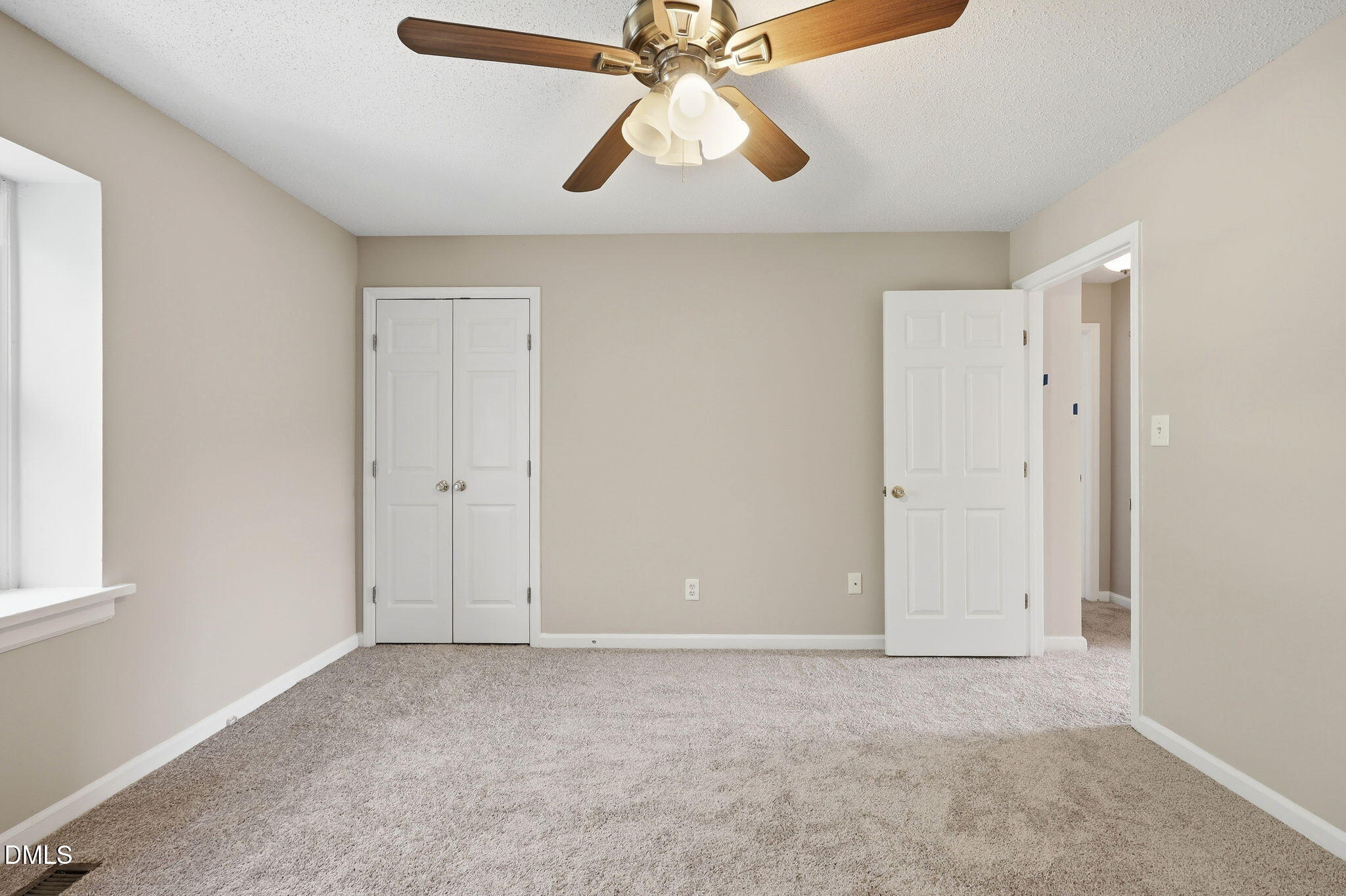 145 Jones Franklin Road, Unit D Raleigh, NC 27606 - Photo 11 of 23 a view of an empty room