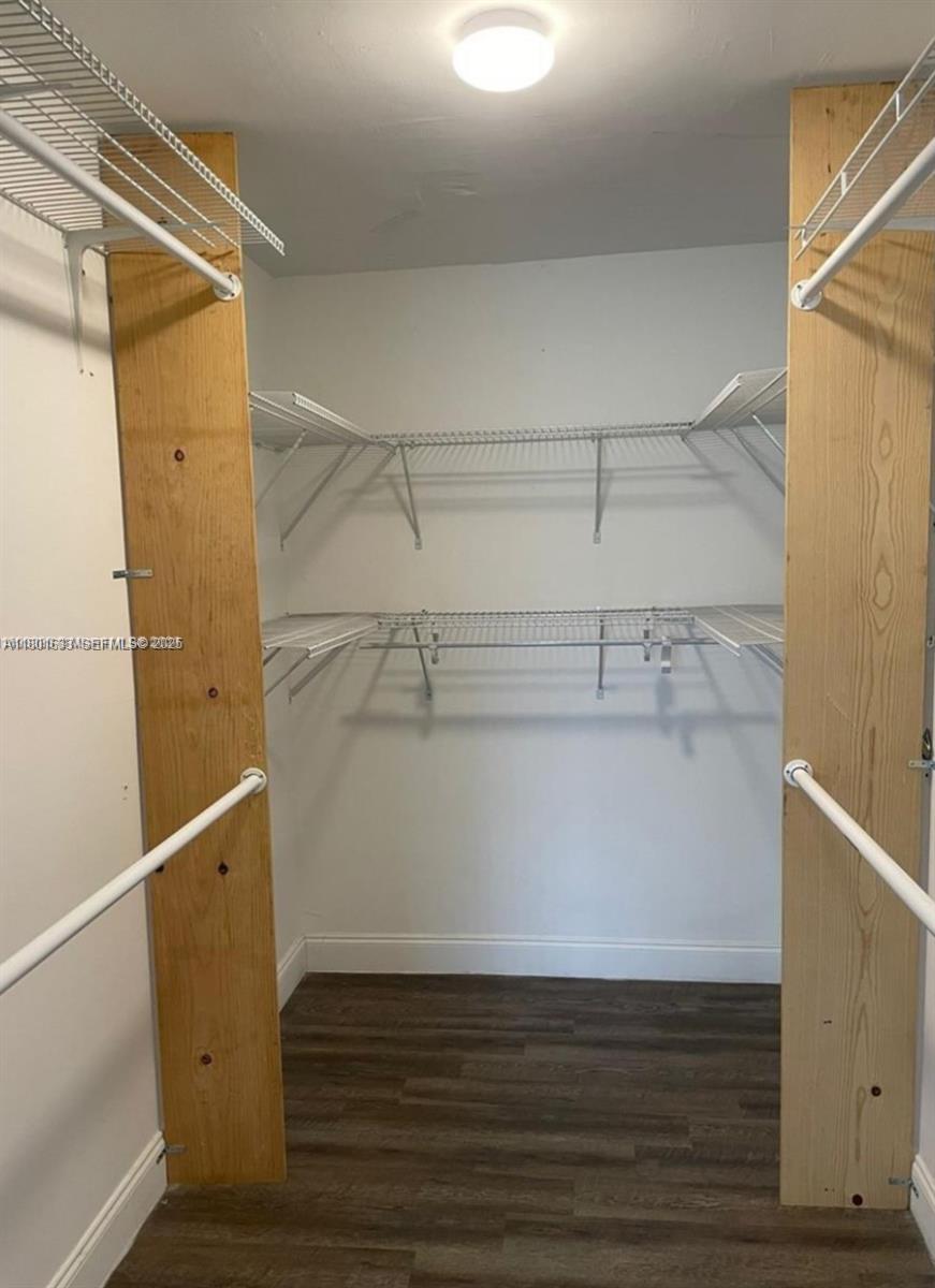 4164 Inverrary Drive, Unit 301 Lauderhill, FL 33319 - Photo 15 of 19 a view of a room with wooden floor