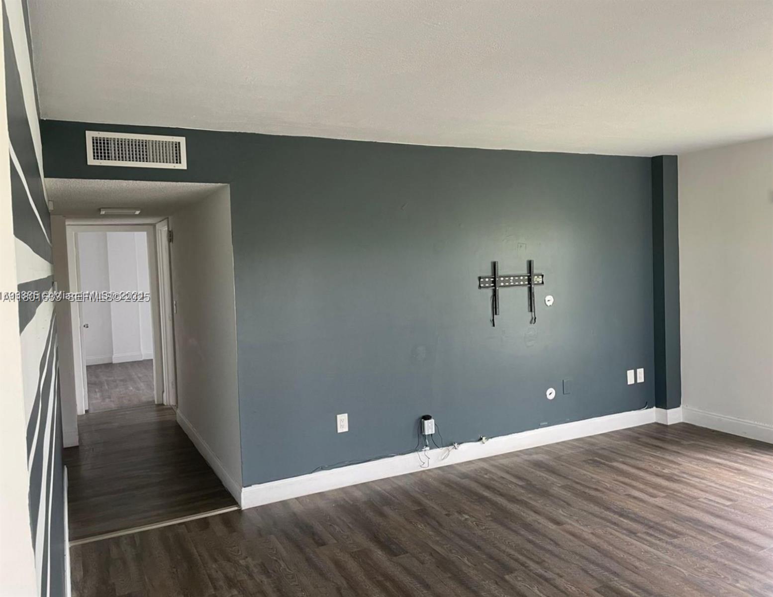 4164 Inverrary Drive, Unit 301 Lauderhill, FL 33319 - Photo 5 of 19 a view of a livingroom with wooden floor