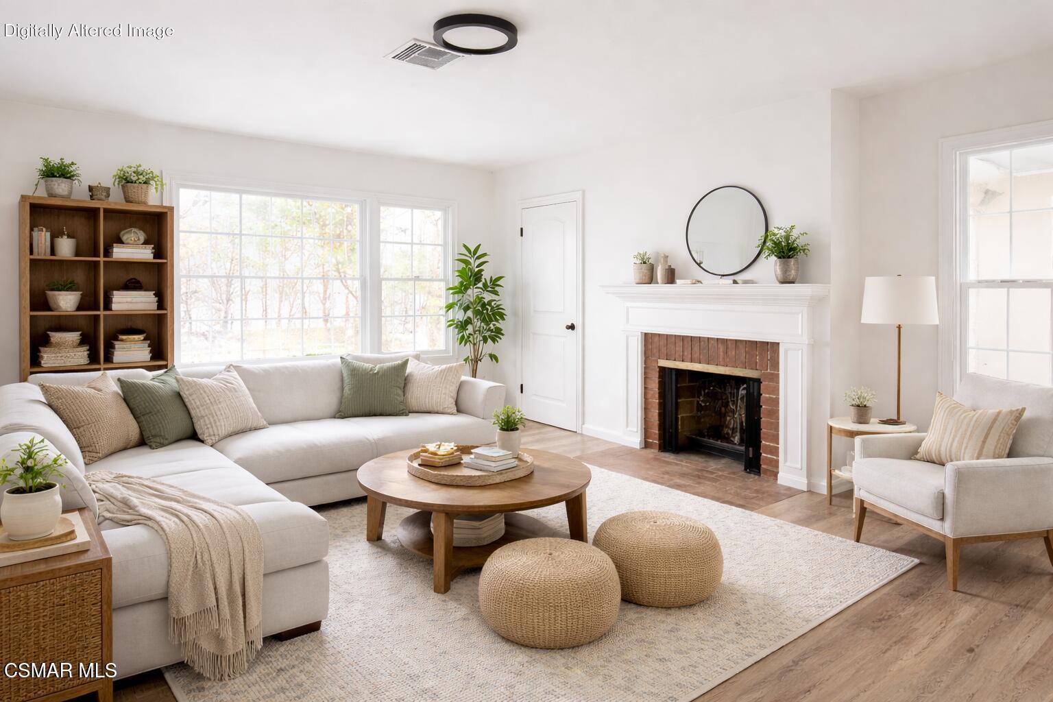 12015 Riverside Drive Valley Village, CA 91607 - Photo 2 of 10 a living room with furniture a fireplace and window