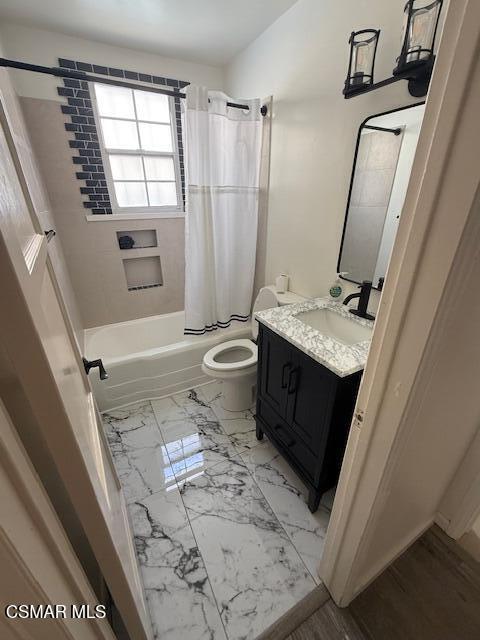 12015 Riverside Drive Valley Village, CA 91607 - Photo 10 of 10 a bathroom with a granite countertop sink toilet and shower