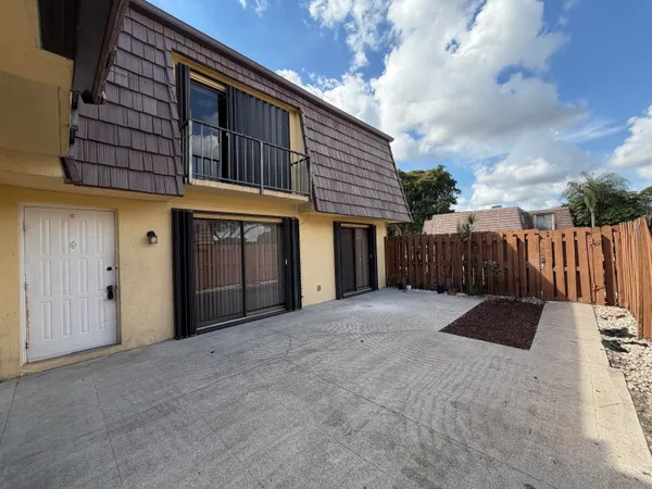 a view of a house with a roof deck