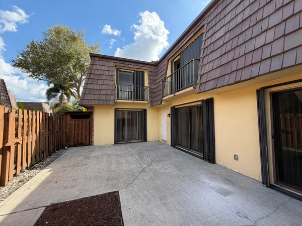 a view of a house with a garage