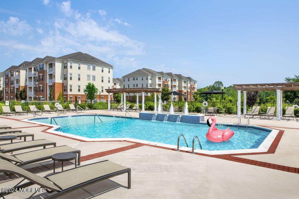 1434 Sierra Drive Hamilton, NJ 08619 - Photo 8 of 8 a view of a patio with a table and chairs