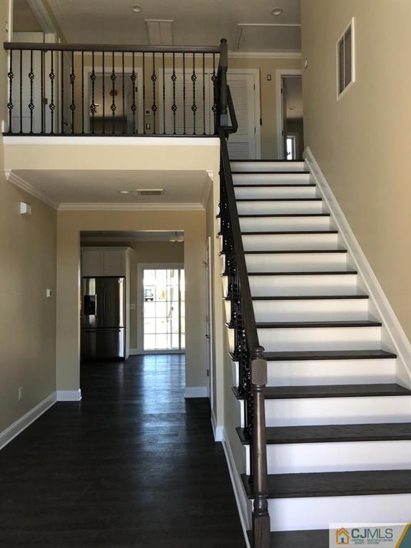 42 Crescent Road Edison, NJ 08817 - Photo 3 of 20 a view of entryway with wooden floor