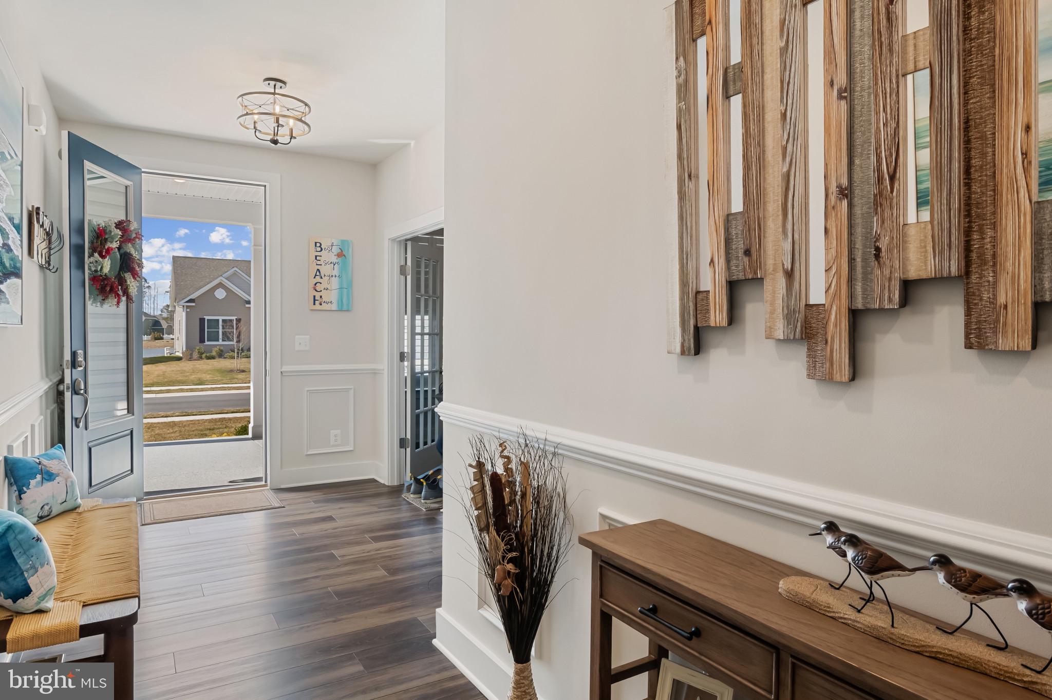 19437 Longfellow Way Georgetown, DE 19947 - Photo 7 of 33 a view of a livingroom with furniture and staircase