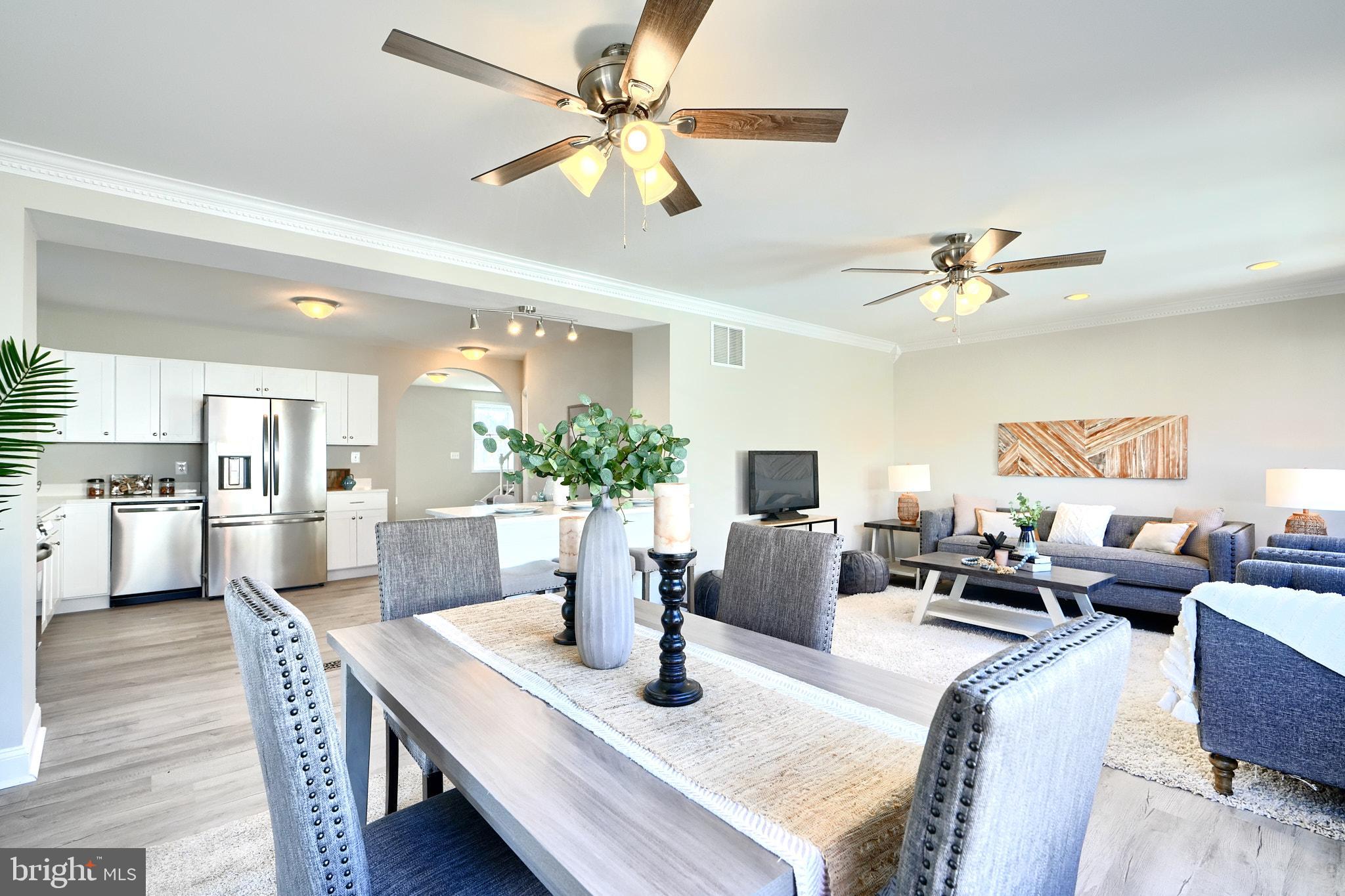 235 Pinewood Road Dundalk, MD 21222 - Photo 21 of 59 a view of a dining room with furniture and a chandelier