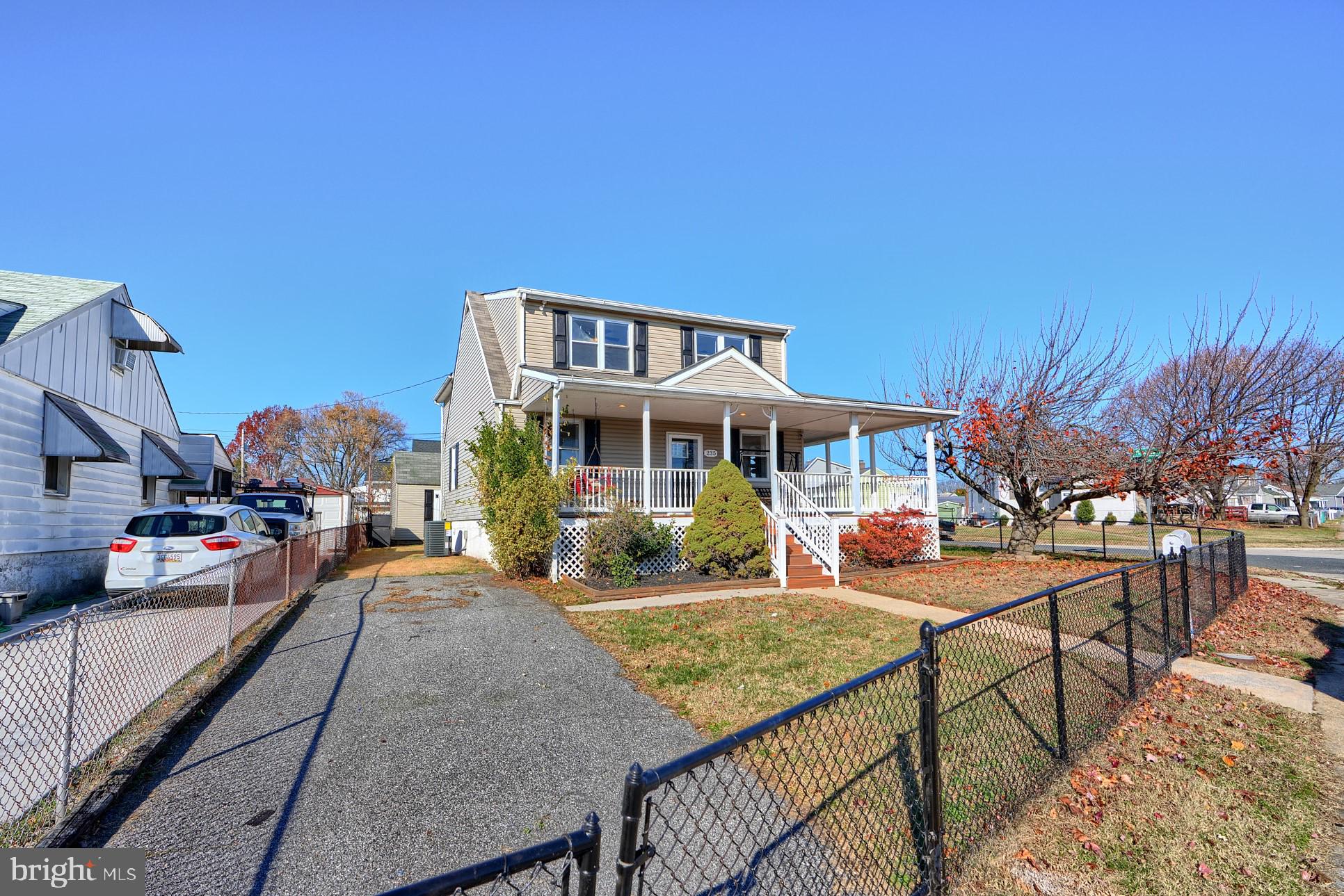 235 Pinewood Road Dundalk, MD 21222 - Photo 2 of 59 a view of a house with backyard porch and sitting area