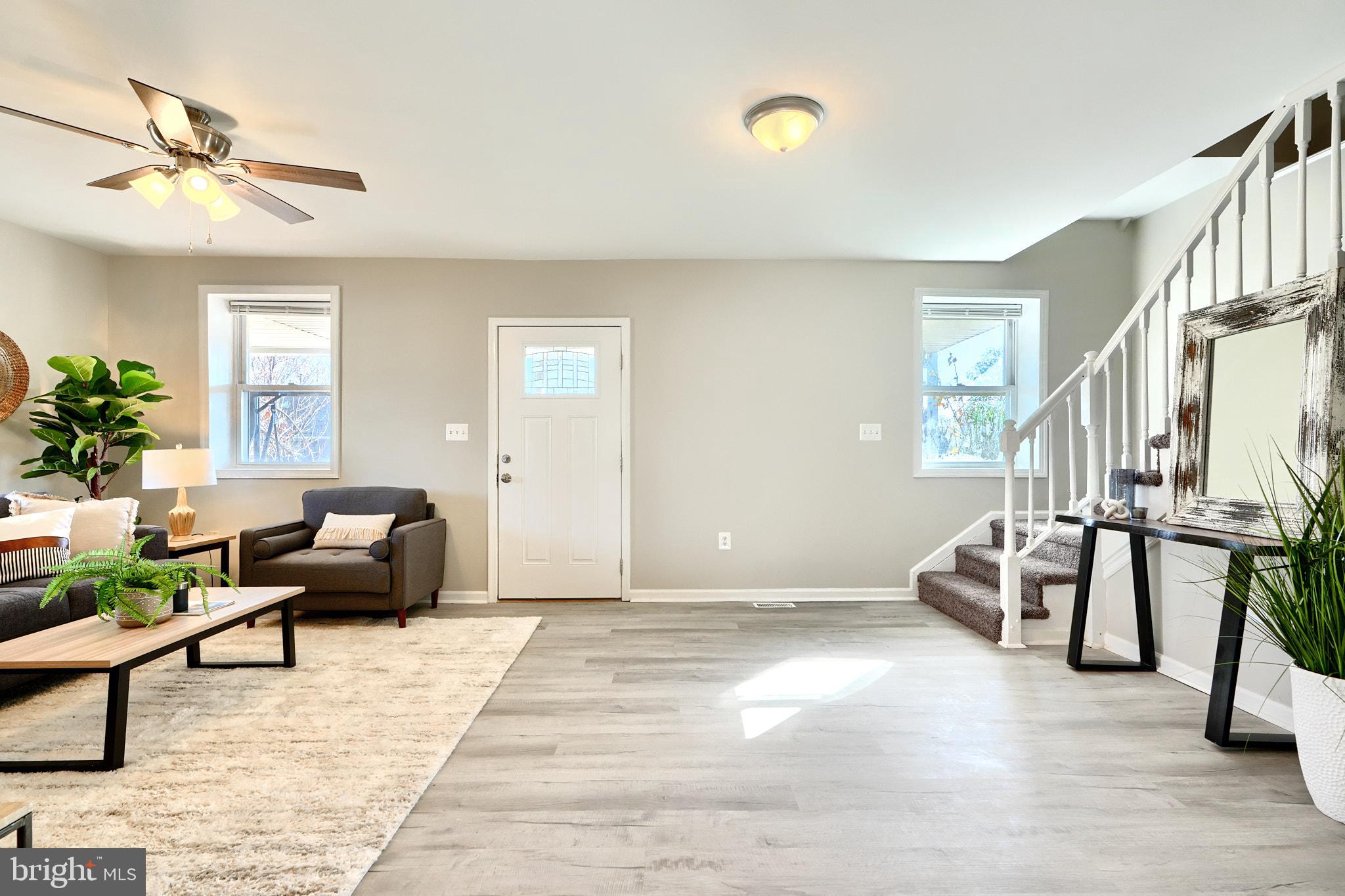 235 Pinewood Road Dundalk, MD 21222 - Photo 30 of 59 a living room with furniture and wooden floor