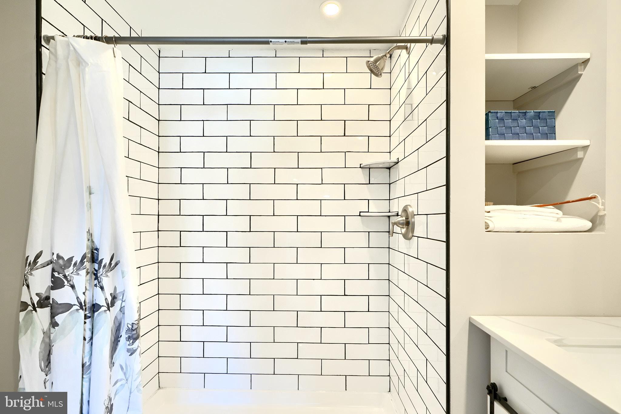 235 Pinewood Road Dundalk, MD 21222 - Photo 39 of 59 a bathroom with a shower