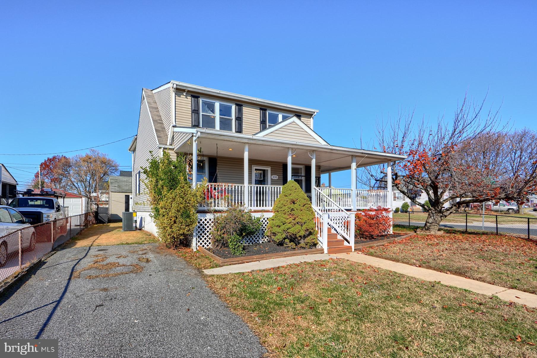 235 Pinewood Road Dundalk, MD 21222 - Photo 4 of 59 front view of a house with a yard