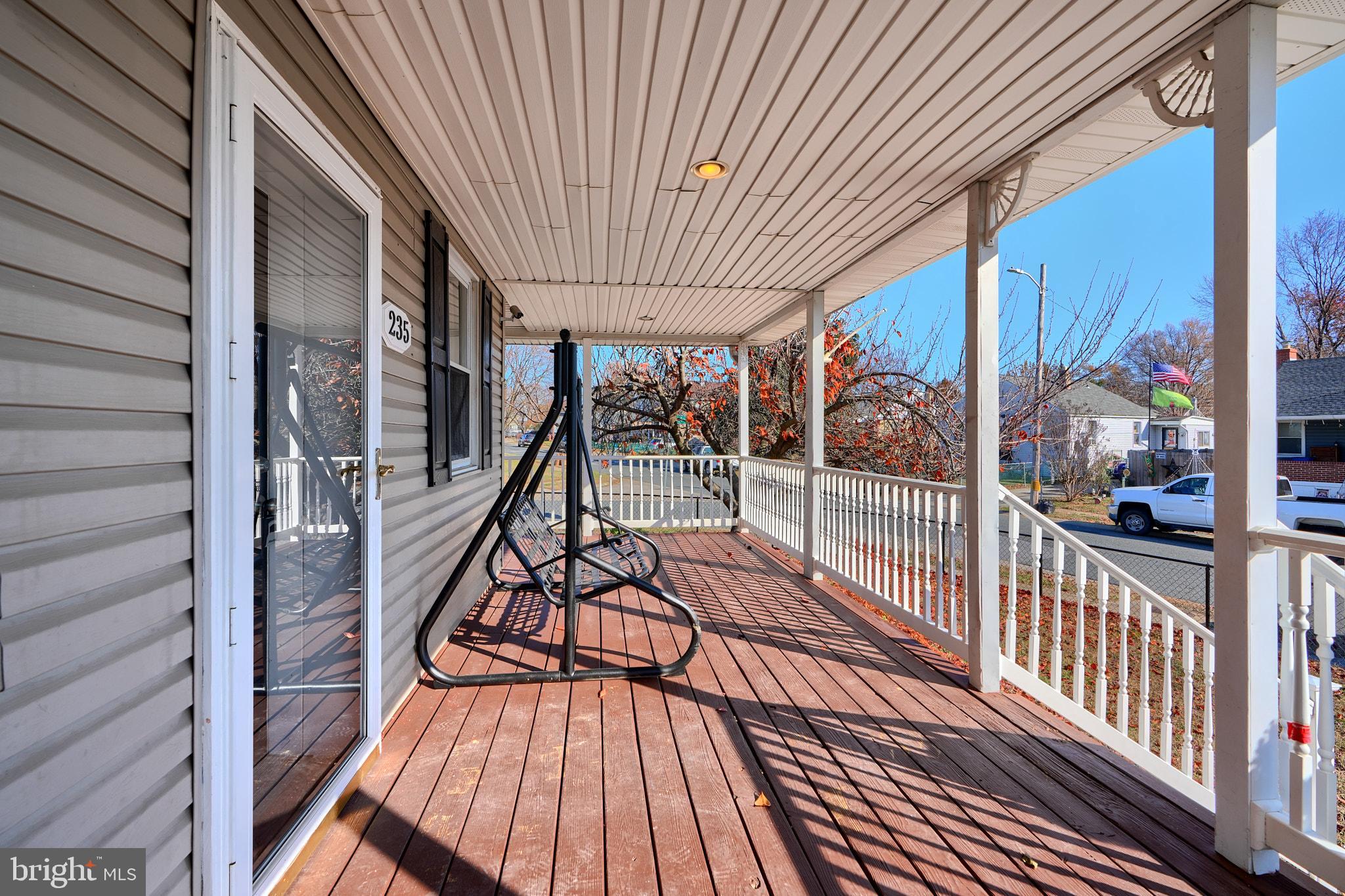 235 Pinewood Road Dundalk, MD 21222 - Photo 7 of 59 a view of balcony with wooden floor
