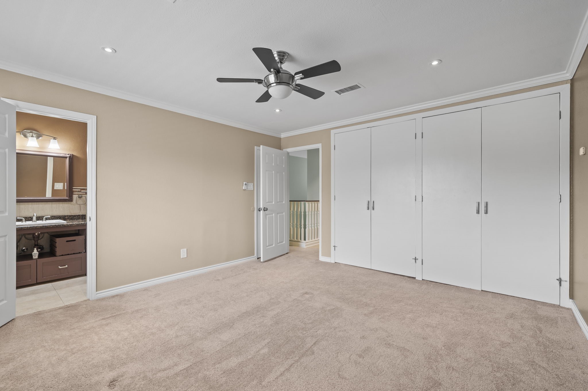 5801 Lumberdale Road, Unit 132 Houston, TX 77092 - Photo 14 of 33 Primary bedroom with custom closets and builtins