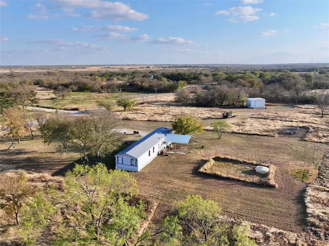 a picture of water with a floor to ceiling window
