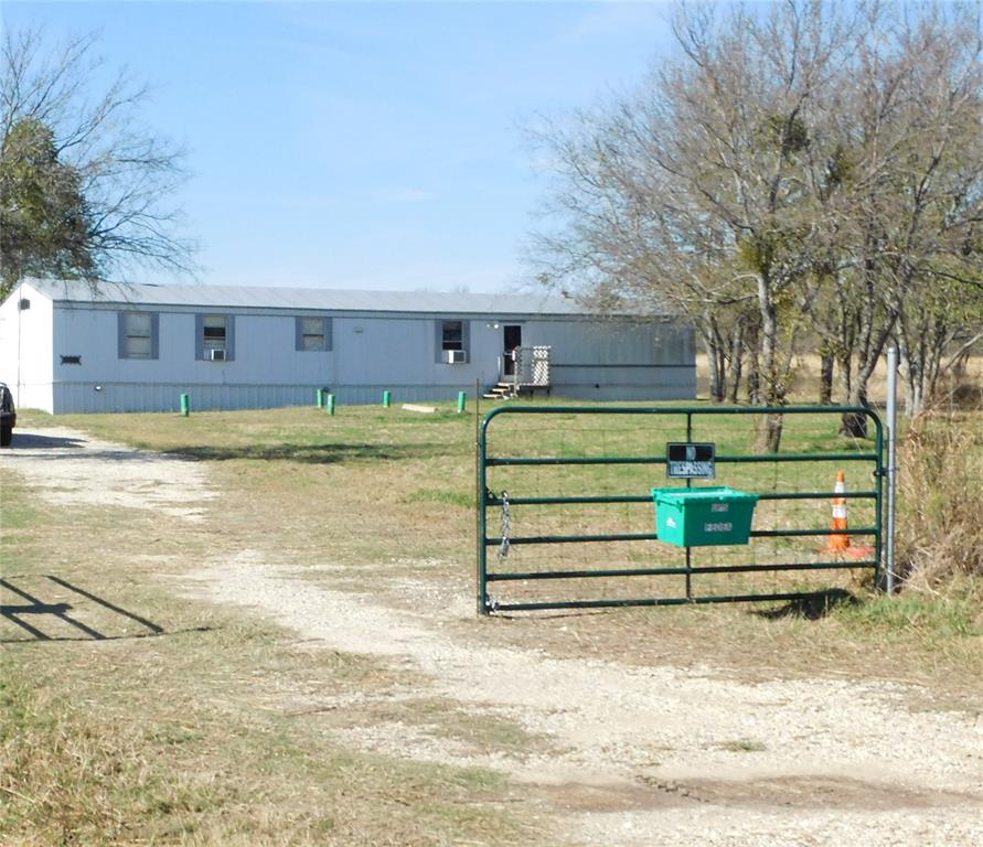 233 HCR 3315 Hubbard, TX 76648 - Photo 31 of 31 a view of a house with a yard