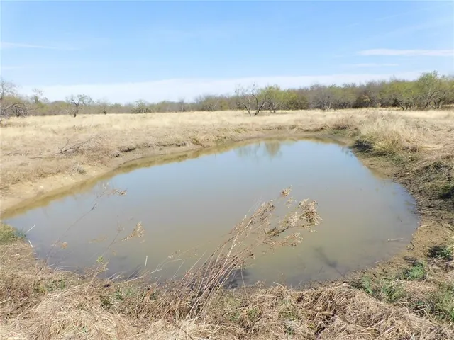 a view of a lake with a mountain
