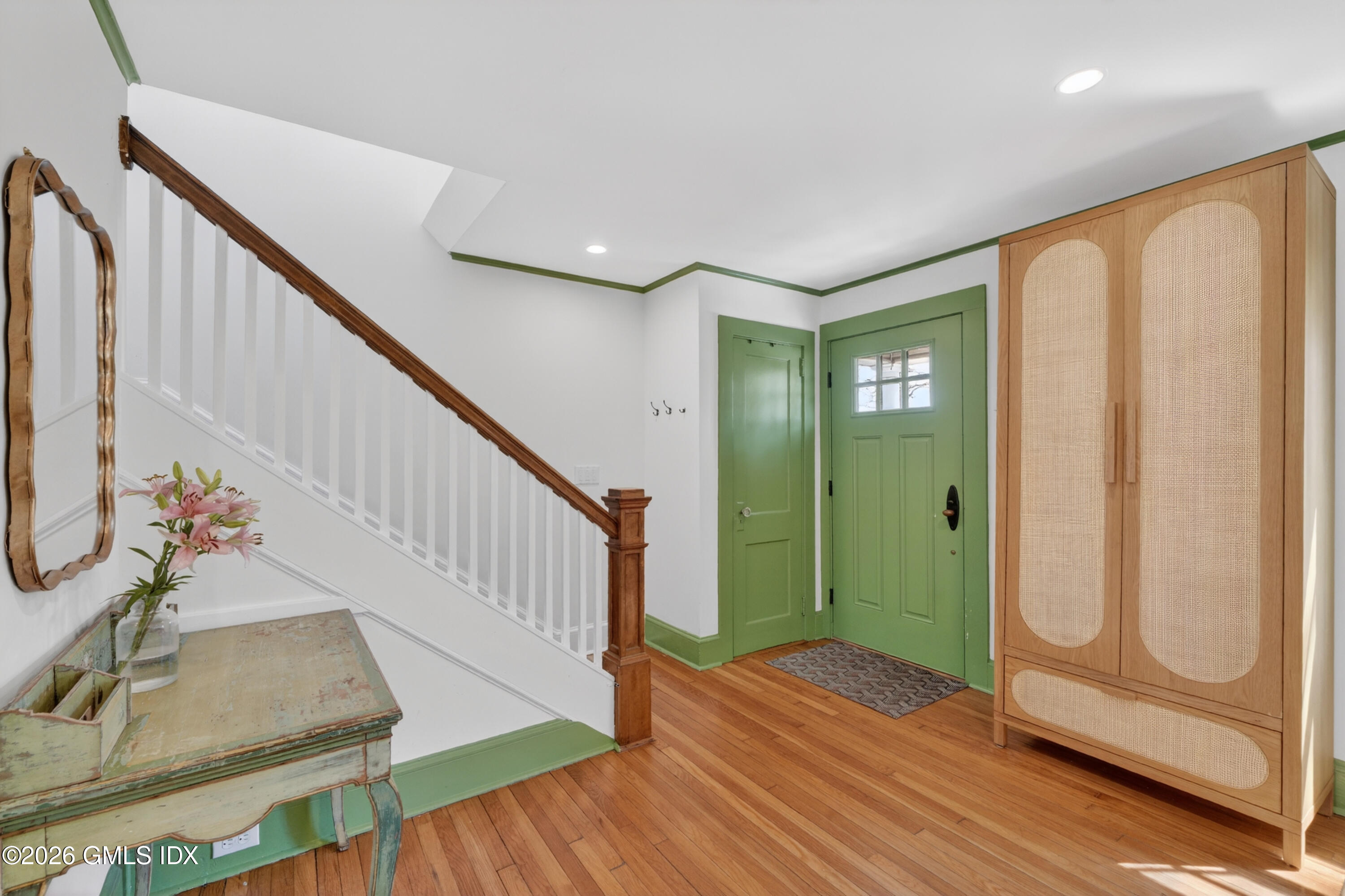 20 Ridge Road Cos Cob, CT 06807 - Photo 4 of 36 a view of an entryway with wooden floor and door