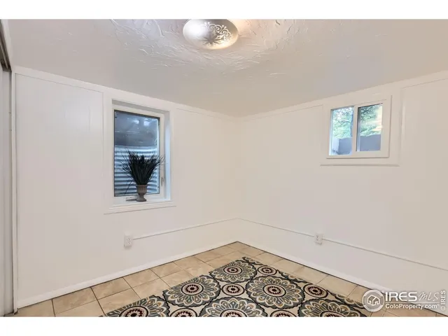 a view of a livingroom with wooden floor