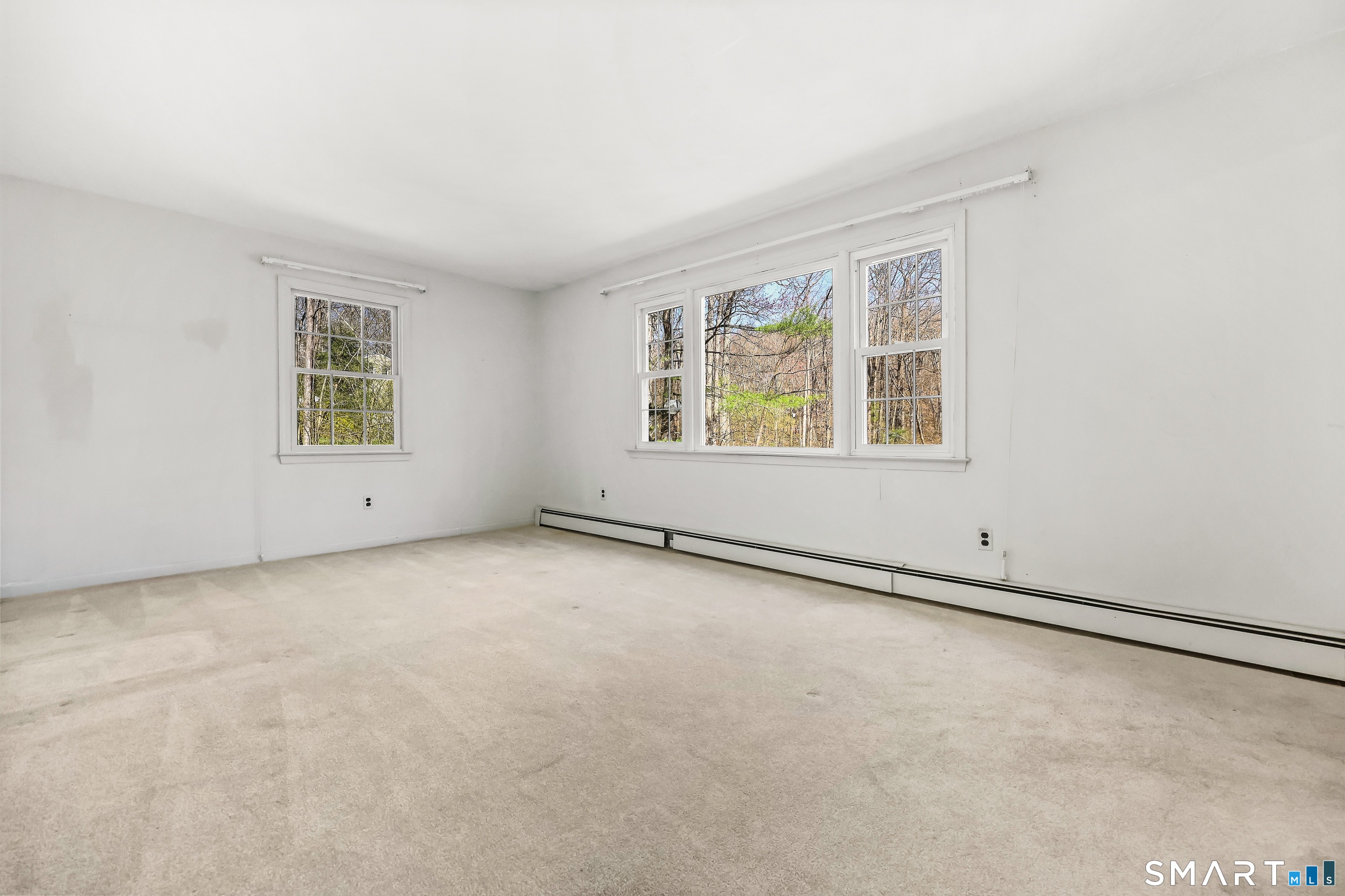145 Wilton Road East Ridgefield, CT 06877 - Photo 14 of 35 Living room with more hardwood!