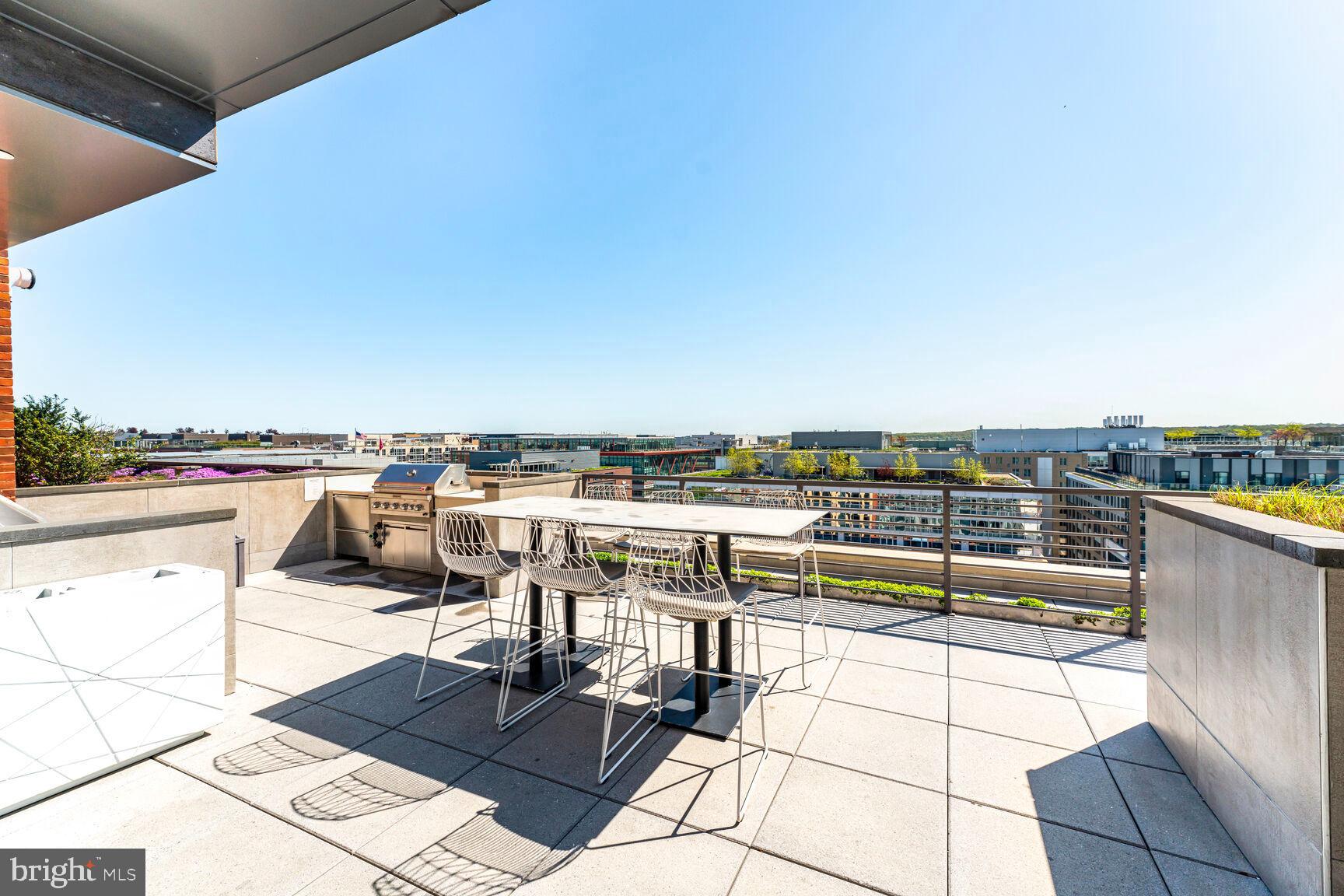1211 Van Street Southeast, Unit 613 Washington, DC 20003 - Photo 20 of 28 a view of a terrace with seating area