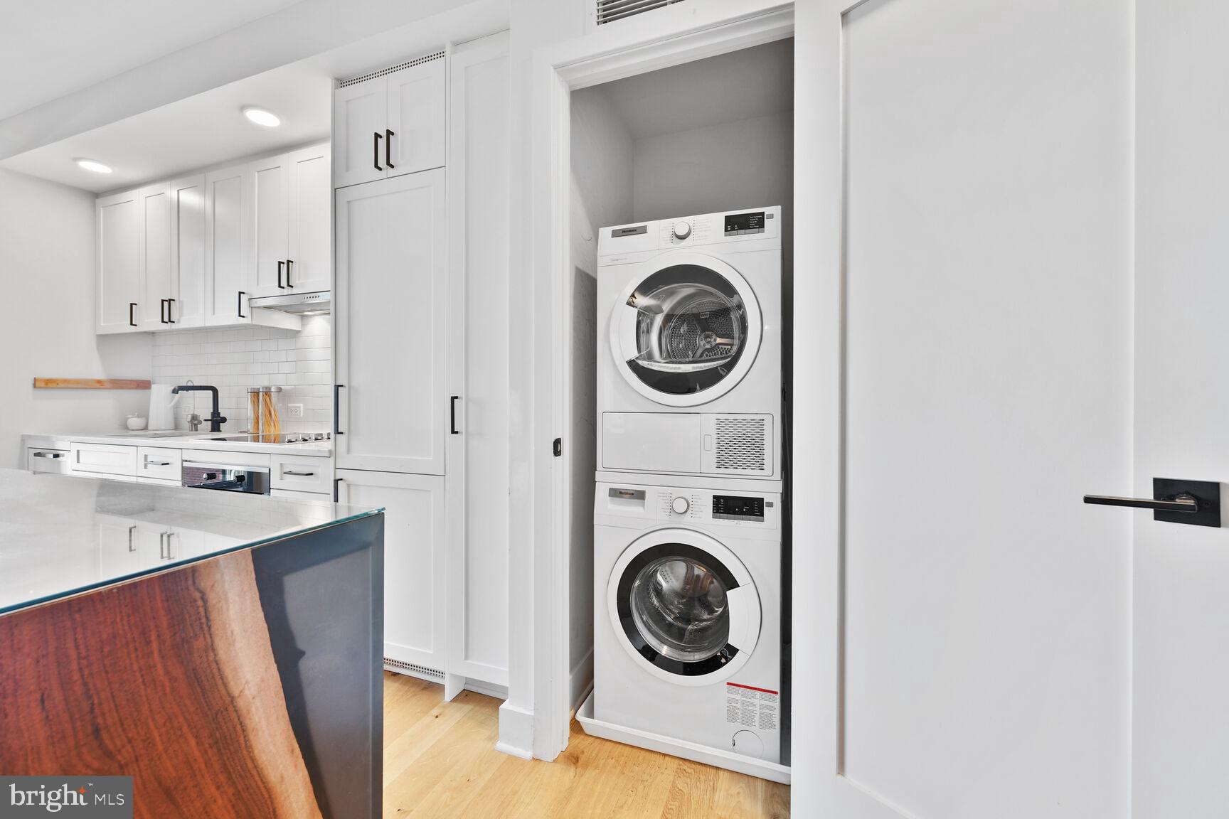 1211 Van Street Southeast, Unit 613 Washington, DC 20003 - Photo 8 of 28 a utility room with sink dryer and washer