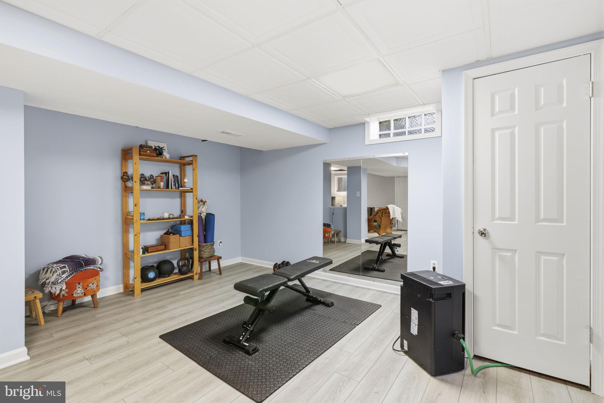 502 North Shamrock Road Bel Air, MD 21014 - Photo 30 of 46 Lower level rec room with LVP flooring