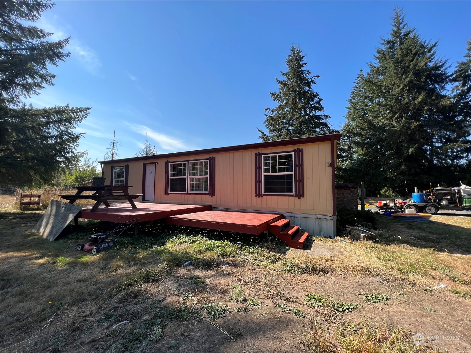 226 Limmer Road Winlock, WA 98596 - Photo 1 of 32 a backyard of a house with yard table and chairs
