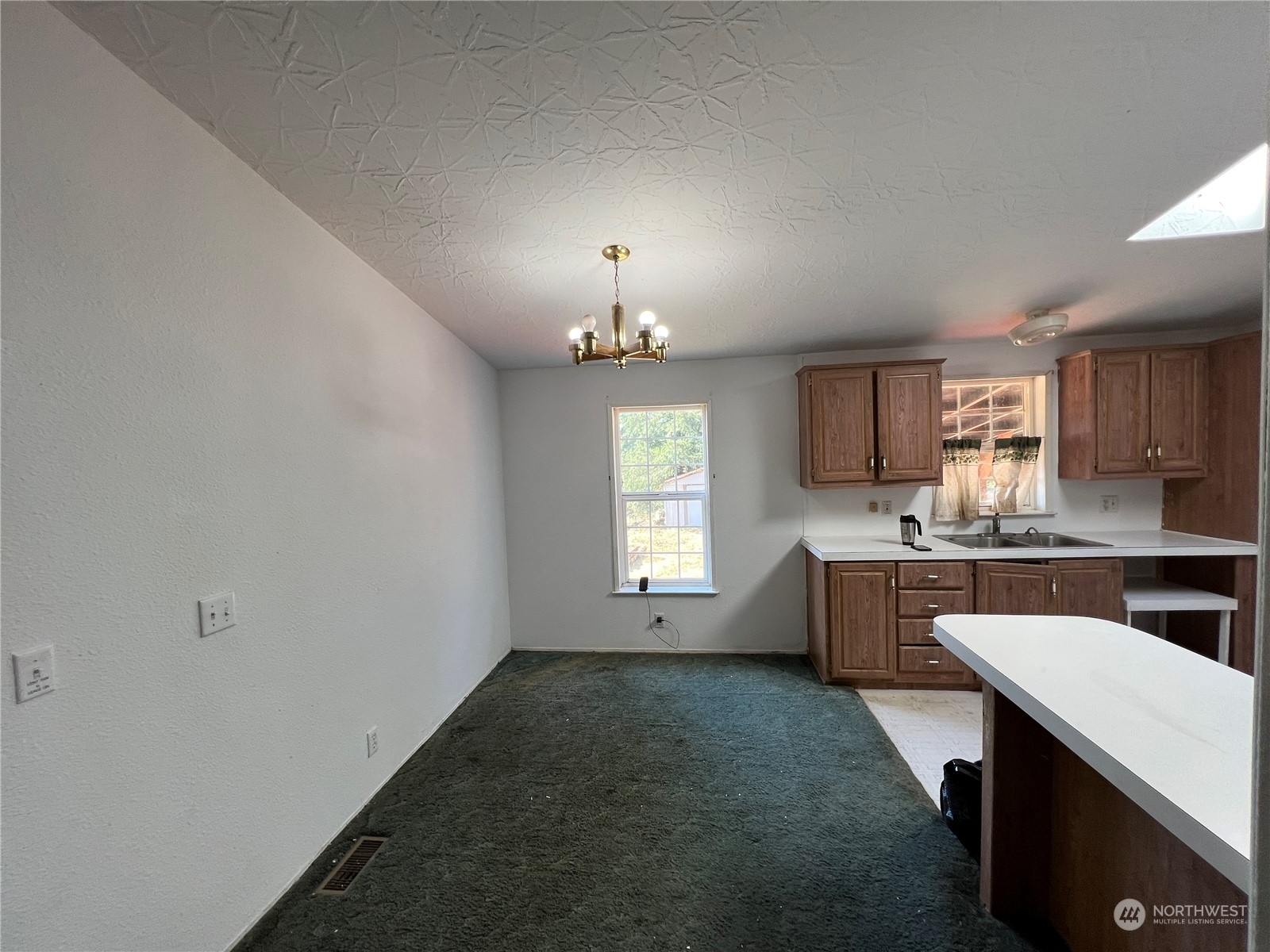 226 Limmer Road Winlock, WA 98596 - Photo 14 of 32 a kitchen that has a lot of cabinets in it and window