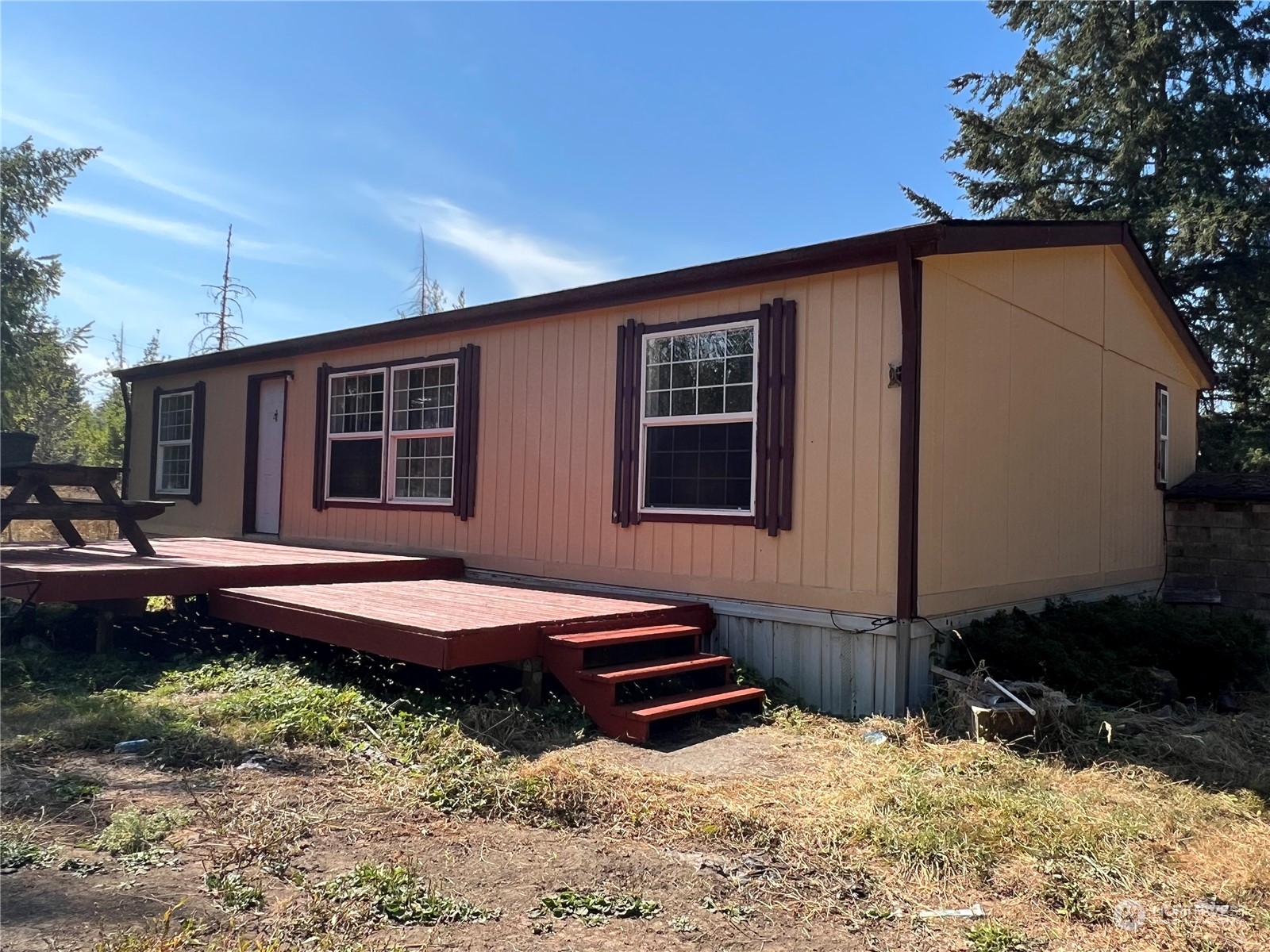 226 Limmer Road Winlock, WA 98596 - Photo 4 of 32 a backyard of a house with yard and outdoor seating