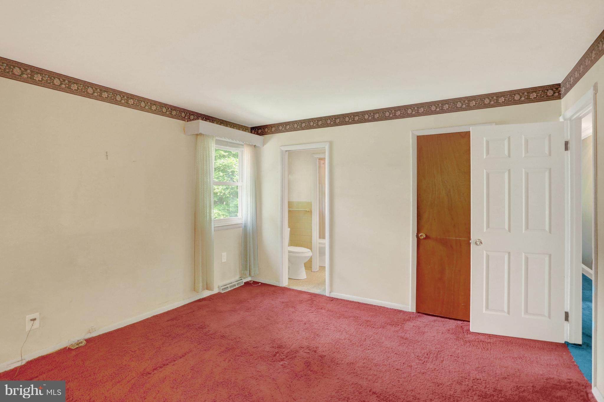 178 Park Road Pasadena, MD 21122 - Photo 13 of 23 Bedroom 2 has hardwood under the carpet