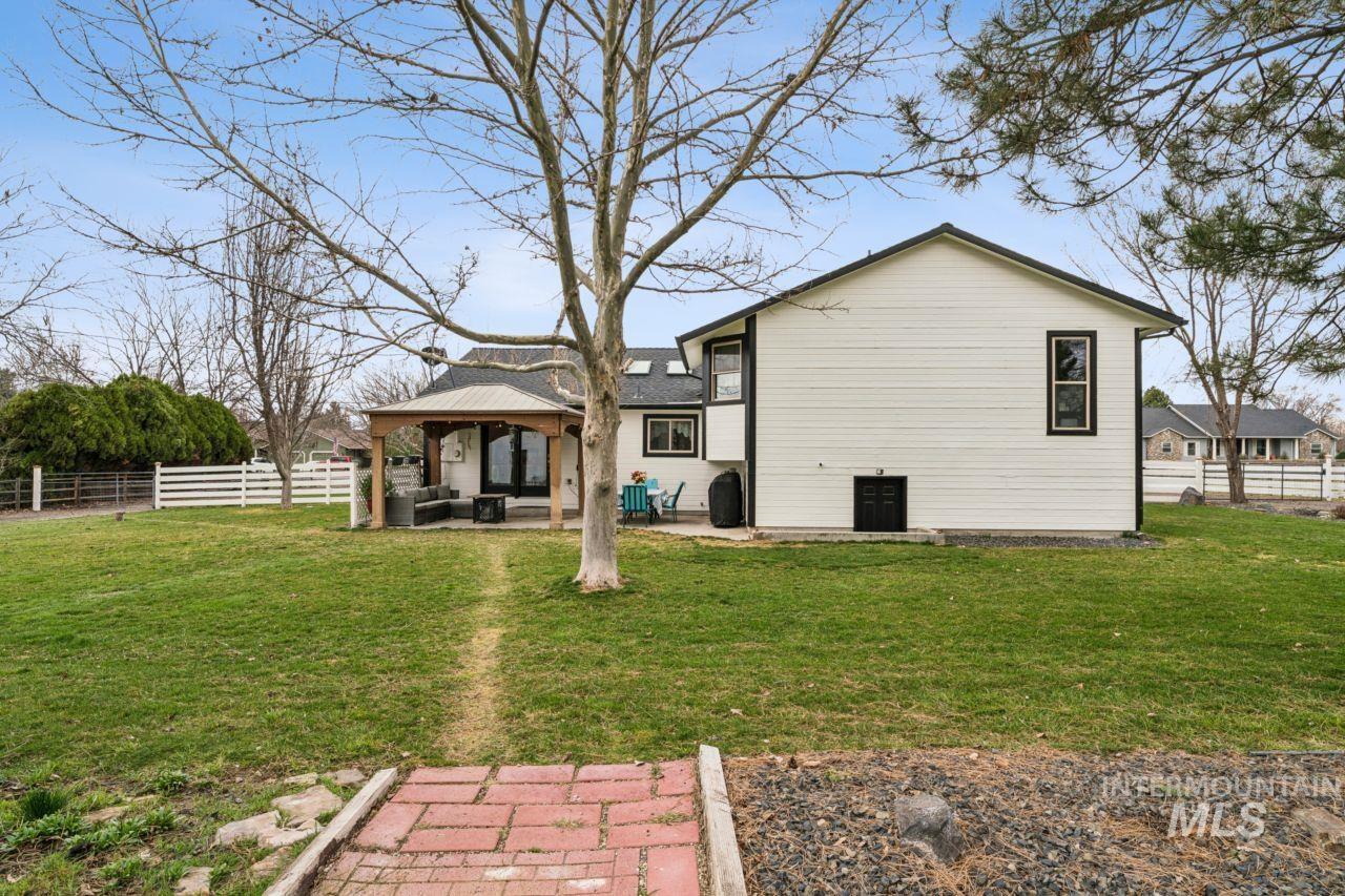 710 Keogh Lane Caldwell, ID 83607 - Photo 44 of 50 Rear view of property with a patio area and a gazebo