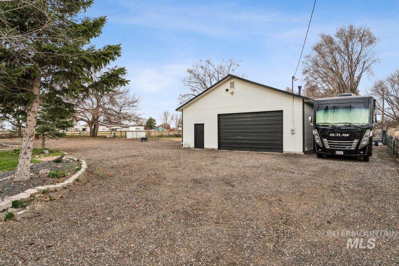 710 Keogh Lane Caldwell, ID 83607 - Photo 10 of 50 Detached garage featuring driveway