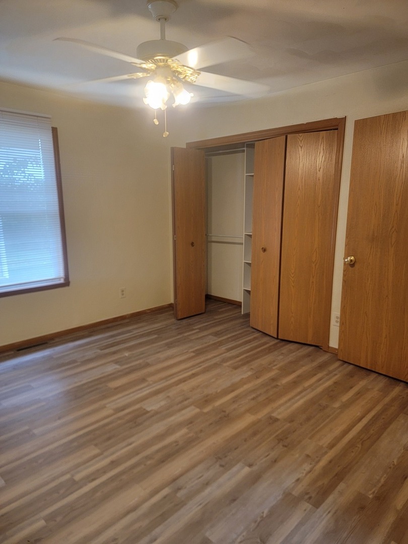 614 Bayfield Road Rockton, IL 61072 - Photo 14 of 42 a view of empty room with wooden floor