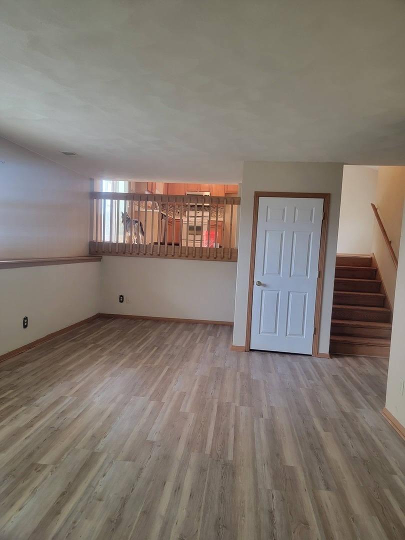 614 Bayfield Road Rockton, IL 61072 - Photo 21 of 42 a view of room with wooden floor