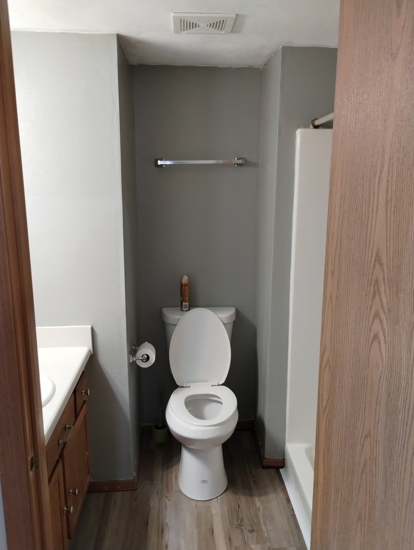 614 Bayfield Road Rockton, IL 61072 - Photo 24 of 42 a white toilet sitting next to a bathroom sink