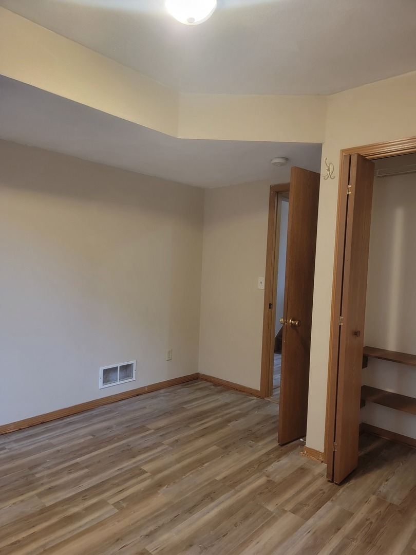 614 Bayfield Road Rockton, IL 61072 - Photo 29 of 42 a view of a room with wooden floor